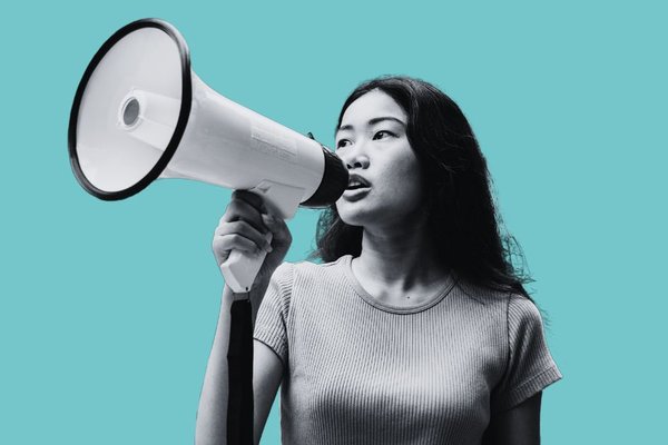 Woman holds a megaphone