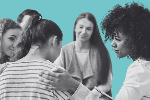 A female support group sitting together