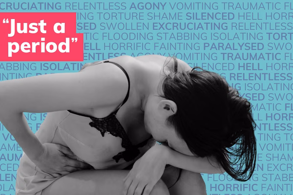 Woman hunched over in pain