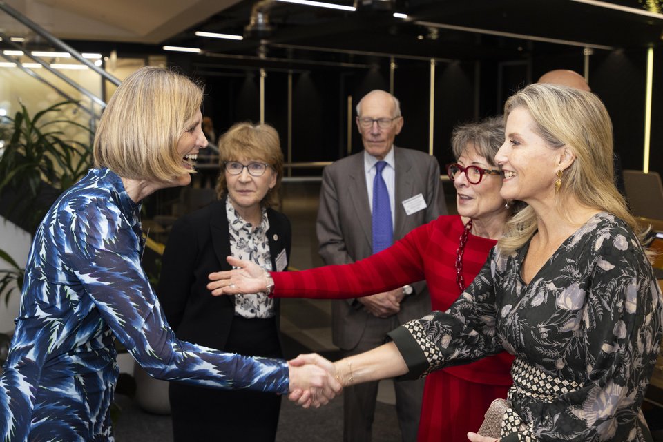 HRH the Duchess of Edinburgh shakes hands with Janet Lindsay at Wellbeing of Women's 60th Anniversary event