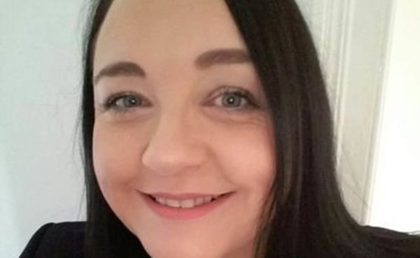Face only photo of a white woman with dark hair